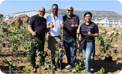 Toshiba team posing with saplings during Miyawaki plantation drive 